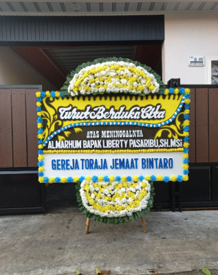 Papan Bunga Duka di Kona